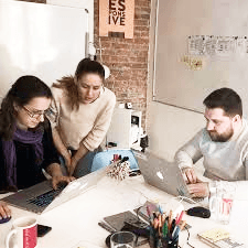 Two colleagues reviewing work